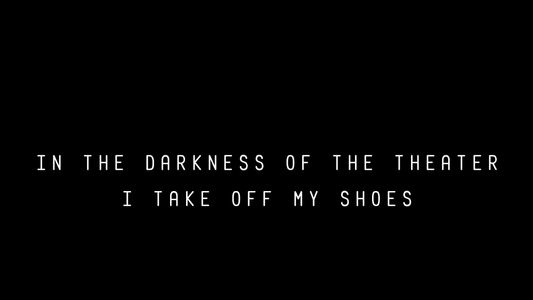 No Escuro do Cinema Descalço os Sapatos